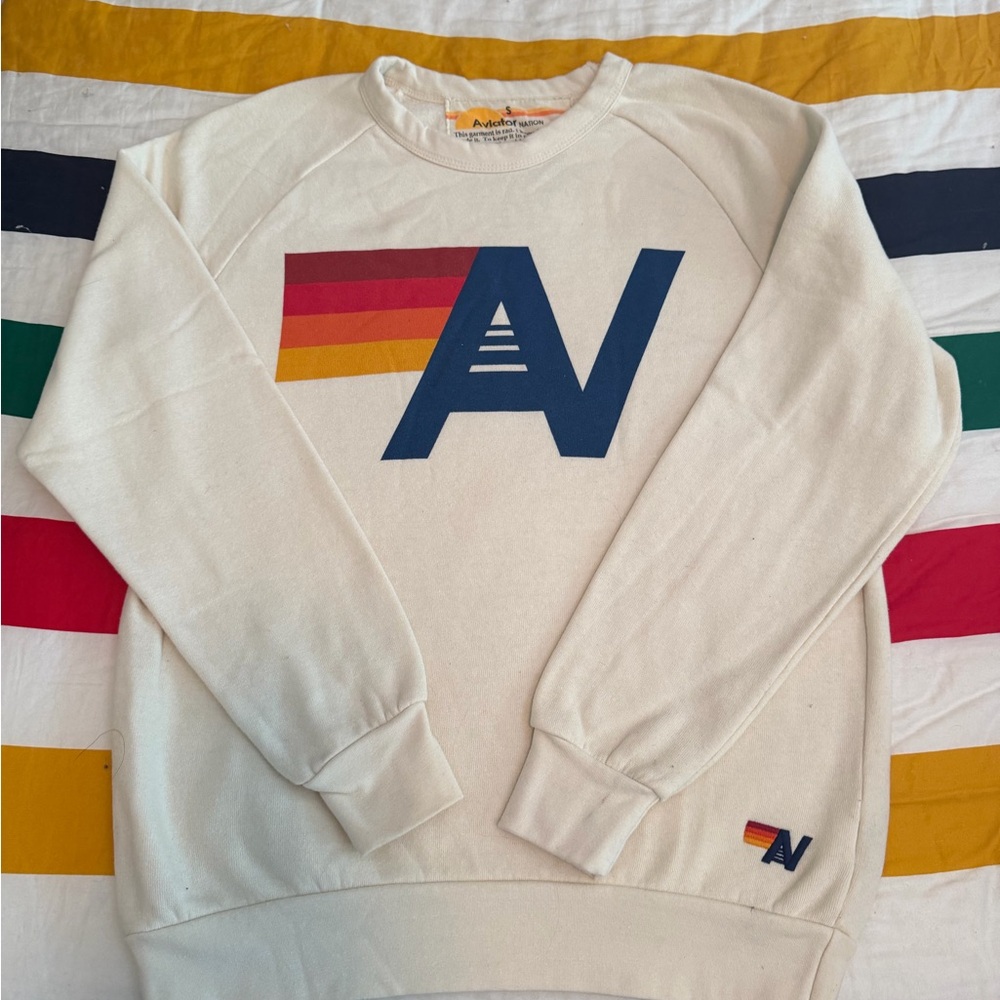 Aviator Nation Cream Crewneck with Navy 'AN' Logo and Retro Stripes